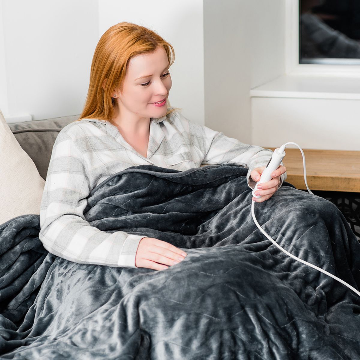 The Somnia™ Heated Throw Blanket.
